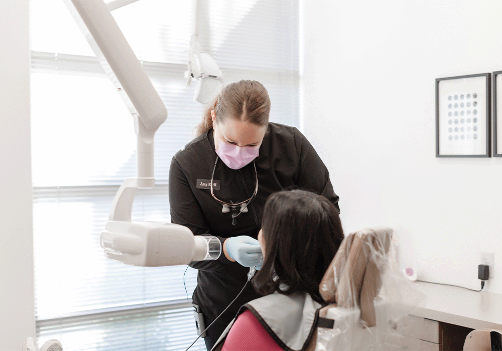 Dental hygienist, Amy, performing X-rays on a patient at Johansen Dental in Chandler, AZ.